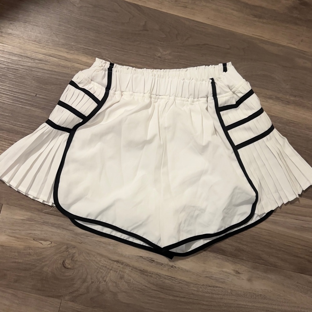 White Pleated Side Panel Shorts with Black Trim